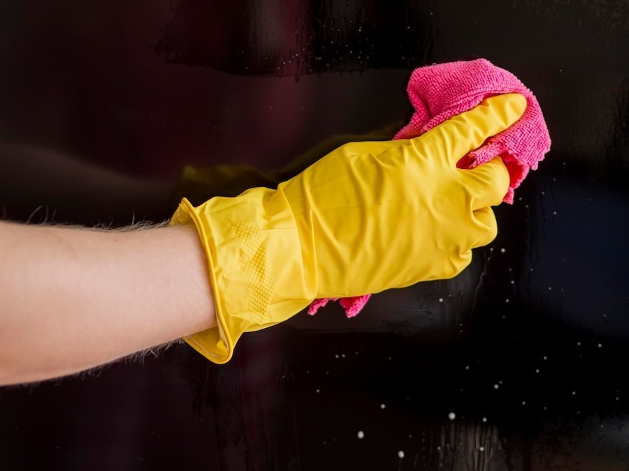 close-up-hand-with-rubber-glove